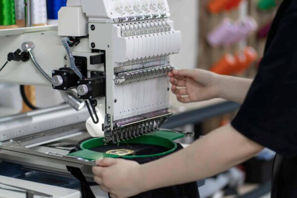 Logo customization for private label swimwear including printing embroidery and heat transfer