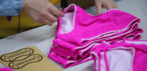 Swimwear packing process with custom packaging and labeling