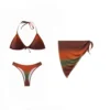 Front view of a 3-piece earthy ombre bikini set showing the solid outer fabric of the top, bottom, and matching side-tie sarong.