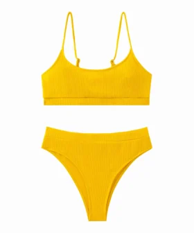 Full front flat-lay view of a solid yellow ribbed two-piece bikini set with thin straps on a white background.