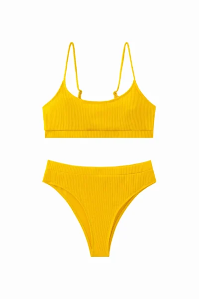 Full front flat-lay view of a solid yellow ribbed two-piece bikini set with thin straps on a white background.