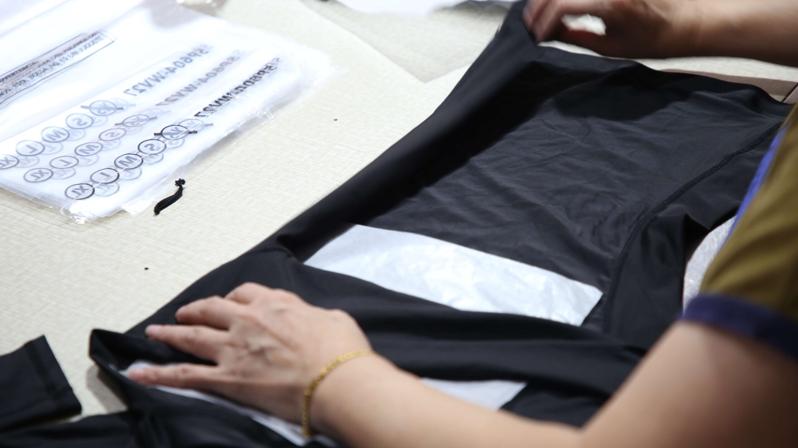 Quality inspection of custom swimwear during manufacturing