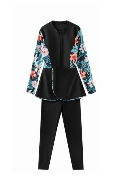 Front flat-lay of the complete three-piece teal tropical swimwear set: onesie, solid shorts, and matching sarong.