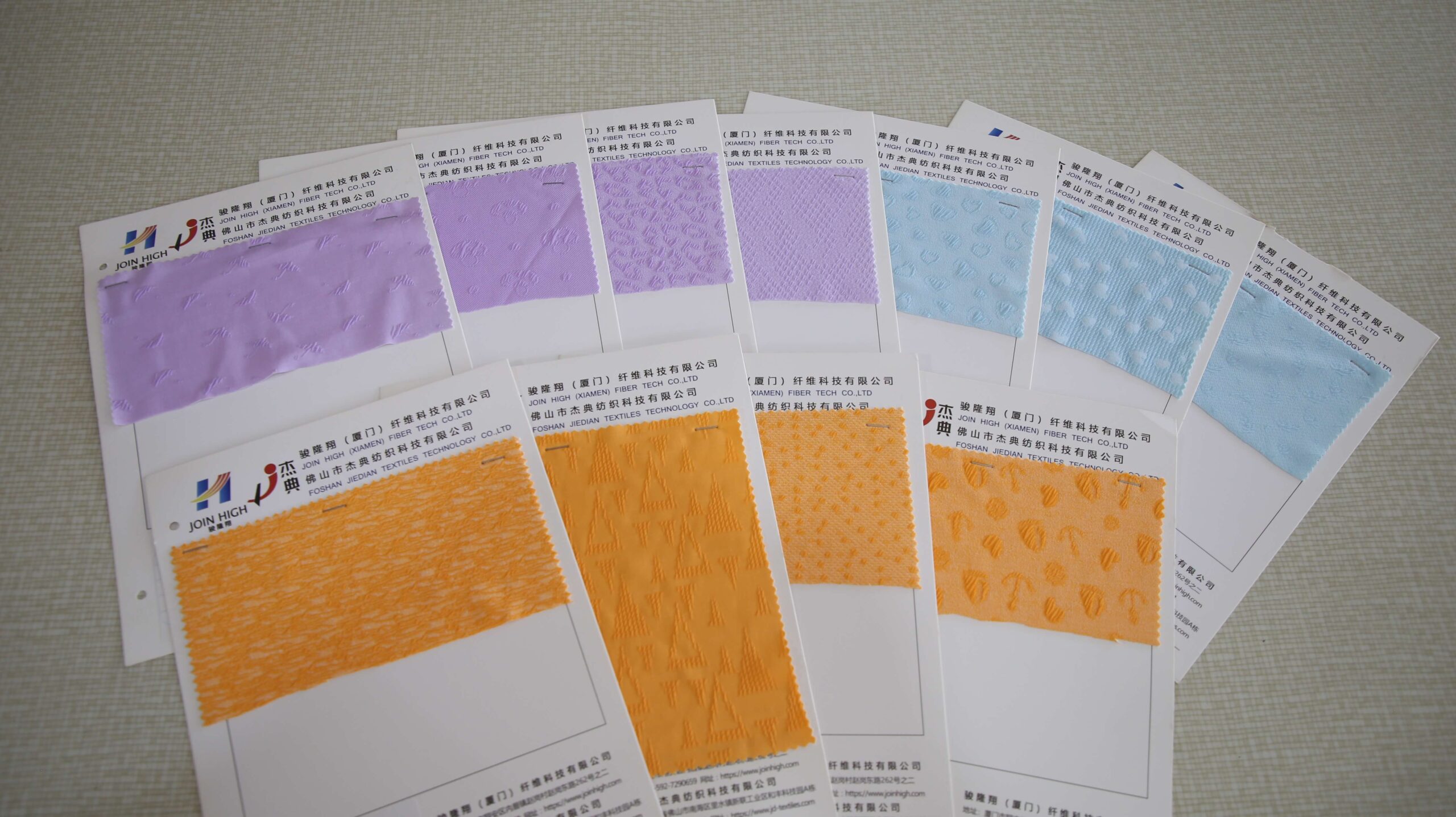 Swimwear fabric swatches and trims for custom swimwear manufacturing