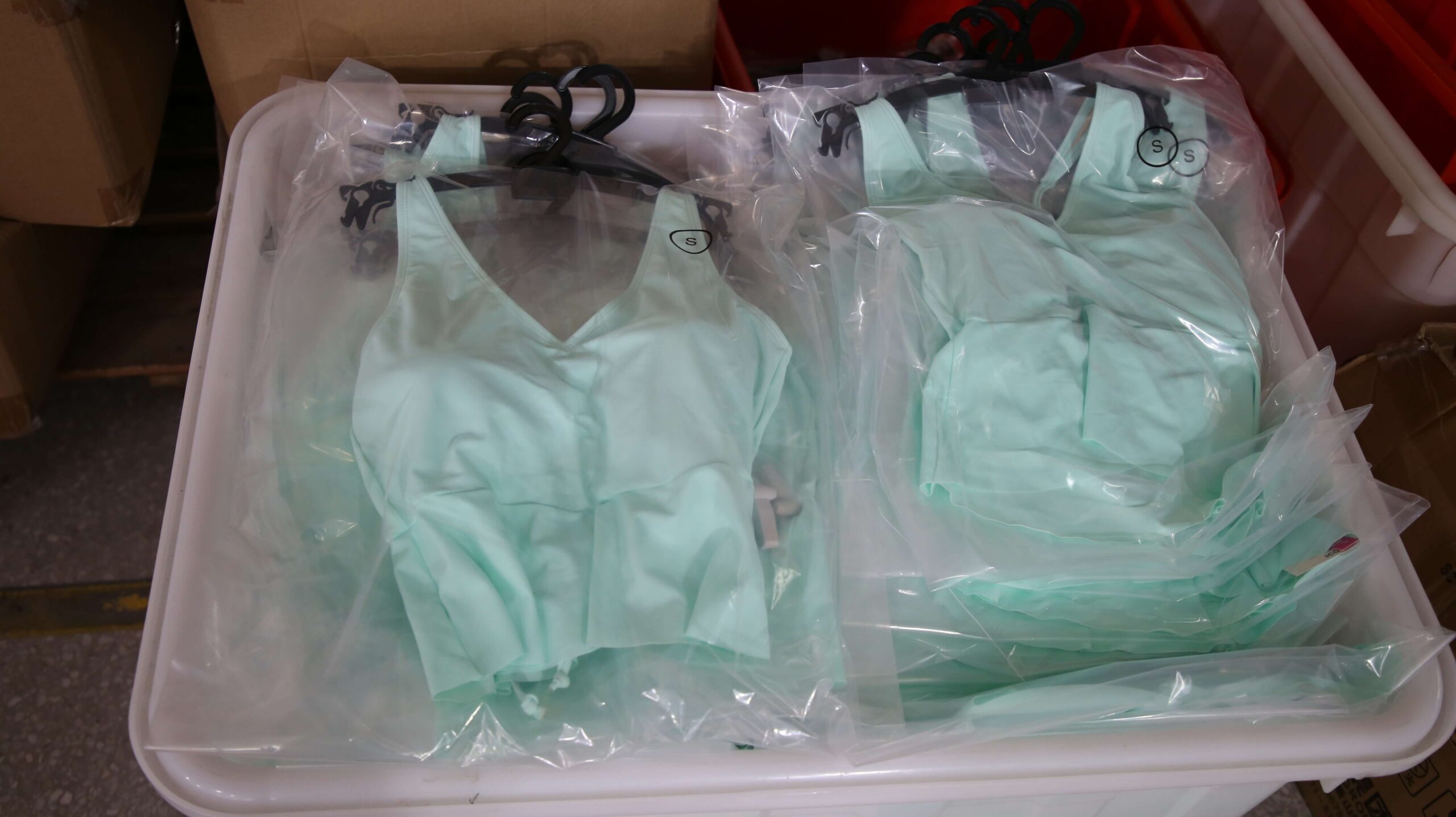Finished custom swimwear packed for international shipping