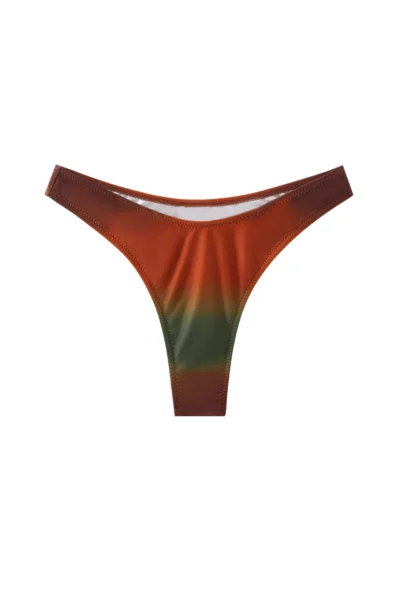 Front flat-lay of a high-cut ombre bikini bottom in rust, orange, and olive gradients with zigzag seams.