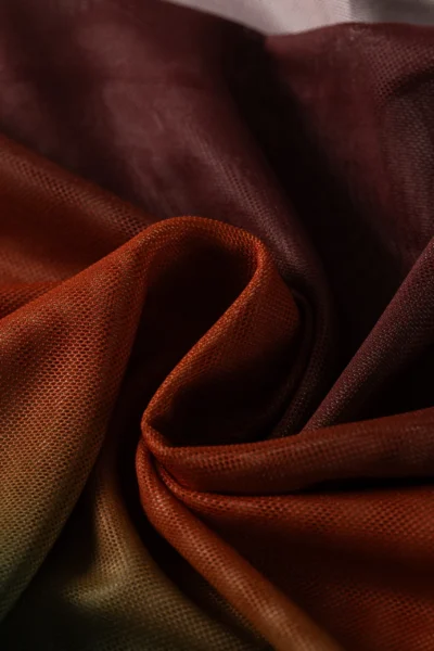 Macro close-up of the ombre bikini fabric bunched and folded, showcasing its fine micro-mesh texture and woven surface.