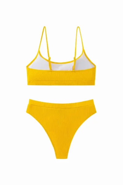 Bright yellow ribbed two-piece bikini set with thin straps and white inner lining, isolated on white background.